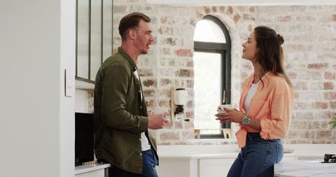 Couple Talking Drinking Coffee Home Brick Wall
