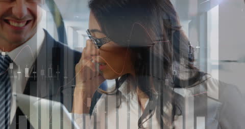 Diverse Business Professionals Analyzing Data with Digital Interface