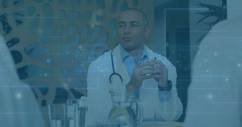 Doctor Collaborating in Modern Healthcare Meeting