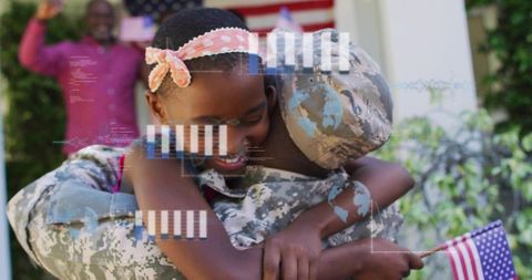 Soldier hugging young girl on porch holding american flag with digital data overlay