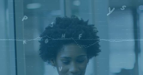 Focused intern analyzing data in modern office environment