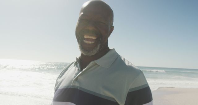 Happy Man Smiling by Beach on Sunny Day - Download Free Stock Images Pikwizard.com