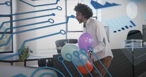 Young professional holding balloons in coworking office with digital circuit overlay