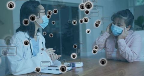 Healthcare Professional Consulting Patient Digital Interface in Medical Office