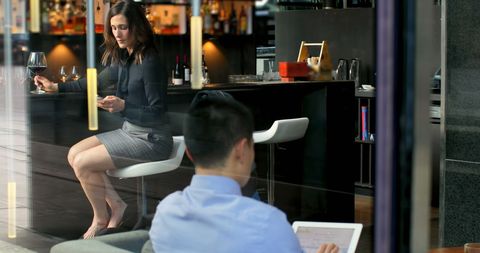 Business Professionals in Modern Hotel Lounge Area