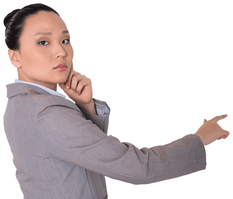 Serious Asian Businesswoman Pointing with Confidence