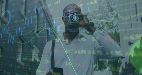 African American Businessman Analyzing Financial Data with Smartphone