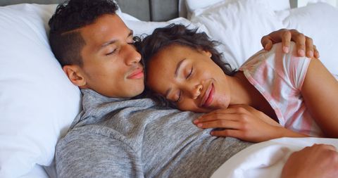 Couple Relaxing in Bed Enjoying Intimacy and Contentment - Download Free Stock Images Pikwizard.com