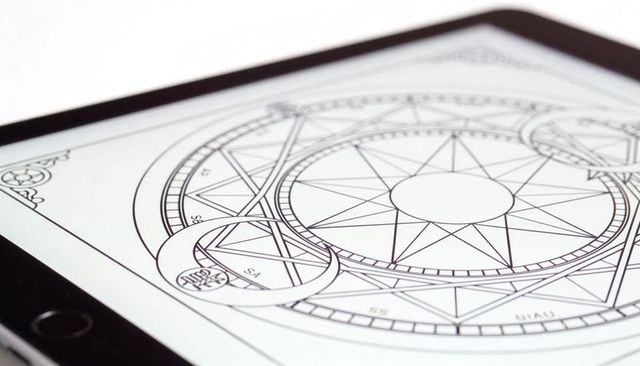 Tablet showing geometric magic circle diagram on minimalist white surface for design