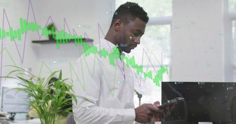 Confident African American Executive Analyzing Financial Data in Office