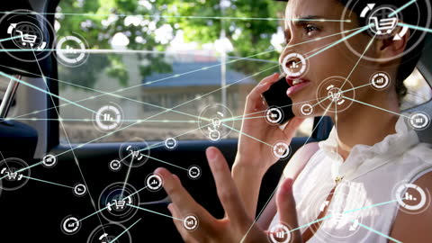 African American Woman Networking on Smartphone in Car