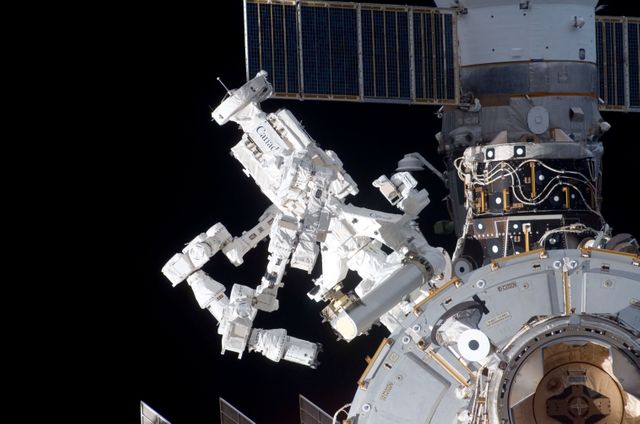 S123-E-009714 (24 March 2008) --- Located on the exterior of the International Space Station's Harmony node, the Canadian-built Dextre, also known as the Special Purpose Dextrous Manipulator, is photographed from Space Shuttle Endeavour as the two spacecraft begin their relative separation. Designed for station maintenance and service, Dextre is capable of sensing forces and movement of objects it is manipulating. It can automatically compensate for those forces and movements to ensure an object is moved smoothly. Dextre is the final element of the station's Mobile Servicing System. Earlier the STS-123 and Expedition 16 crews concluded 12 days of cooperative work onboard the shuttle and station. Undocking of the two spacecraft occurred at 7:25 p.m. (CDT) on March 24, 2008.