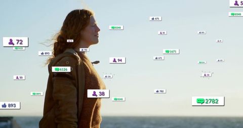 Woman on coastline with floating social icons showing digital influence