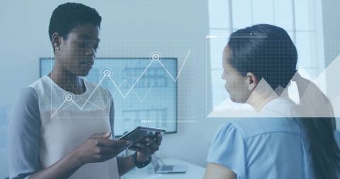 Business Professionals Analyzing Digital Financial Data in Modern Office