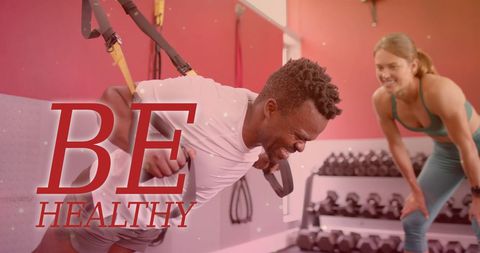 Diverse athletes enjoying workout with motivation text