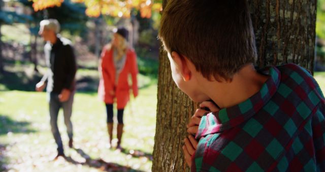 Child Watching Parents Having Serious Conversation in Park - Download Free Stock Images Pikwizard.com