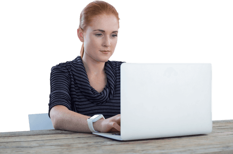 Focused Businesswoman Using Laptop on Rustic Wooden Table Transparent - Download Free Stock Videos Pikwizard.com
