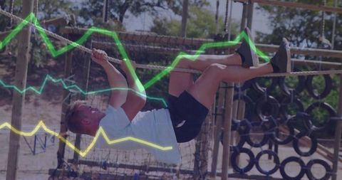 Athlete gripping rope obstacle on course with tire wall and green-yellow data overlay
