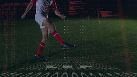 Soccer Player Kicking Ball with Digital Data Overlay at Night
