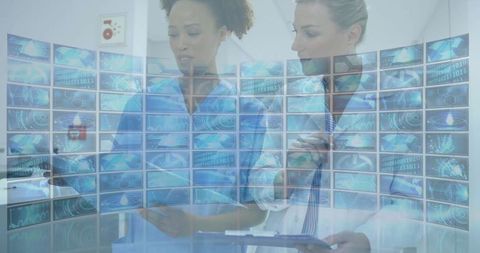 Healthcare professionals discussing digital diagnostic data