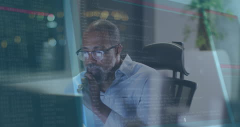 Focused Businessman Analyzing Data on Laptop with Tech Overlay