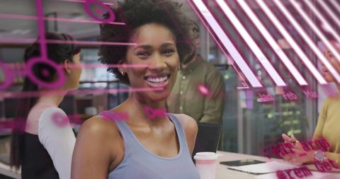 Confident Professional with Financial Graphics in Modern Office