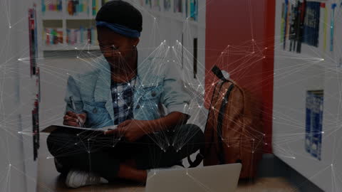 Student Engaging with Technology in University Library