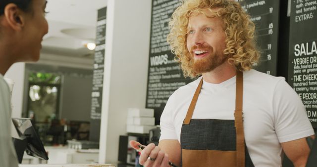 Smiling Barista Taking Order in Modern Cafe - Download Free Stock Images Pikwizard.com