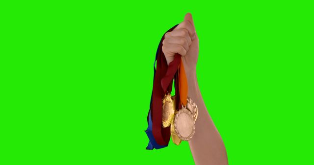 Hand Holding Gold Medals Offering Victory - Download Free Stock Images Pikwizard.com