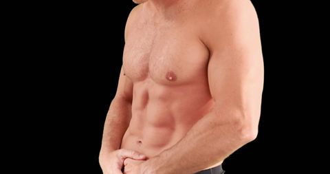 Muscular Athletic Man Posing Shirtless on Black Background - Download Free Stock Images Pikwizard.com