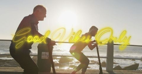 Senior Couple Embracing Good Vibes with Coastal Exercise