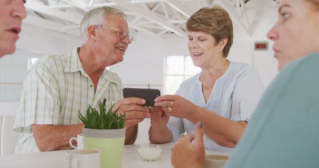 Senior Friends Enjoying Social Media on Smartphone - Download Free Stock Images Pikwizard.com