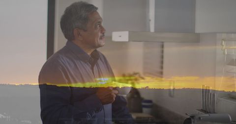 Pensive Senior Man Experiencing Reflective Sunset Memories