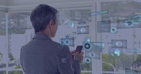 Business Professional Interacting with Holographic Displays