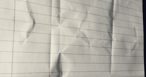 Crumpled Lined Paper Close Up with Shadows and Folds - Download Free Stock Images Pikwizard.com