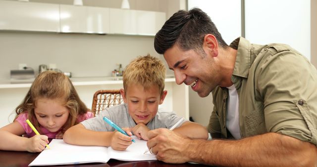 Father Helping Kids with Homework at Home - Download Free Stock Images Pikwizard.com