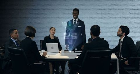 Business Team Discussing Holographic Project in Modern Office - Download Free Stock Images Pikwizard.com