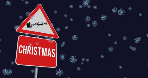 Christmas road sign with snowflakes in night sky