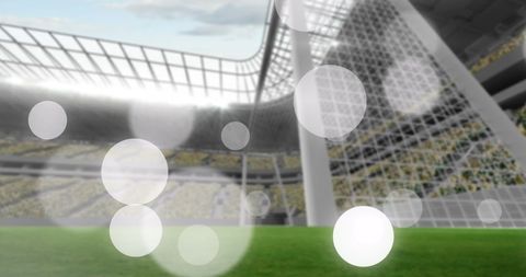 Digital soccer stadium with blurred spots and glowing lights