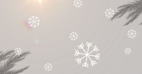 Festive Snowflakes with Sunburst on Grey Background