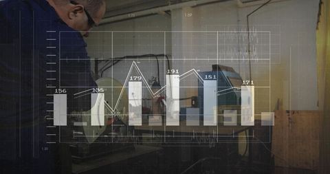 Technician calibrating machines with graph screen interface