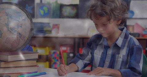 Elementary student writing at desk with animated globe labels teaching geography lesson
