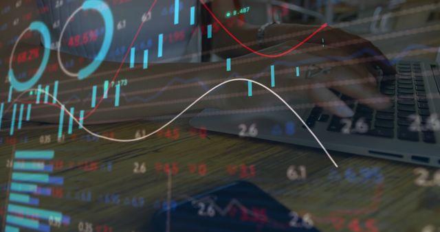 Analyzing Financial Data on Laptop with Overlayed Stock Charts - Download Free Stock Images Pikwizard.com