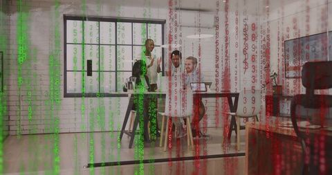 Diverse team collaborating in modern open-plan office with cyber code overlay and analytics