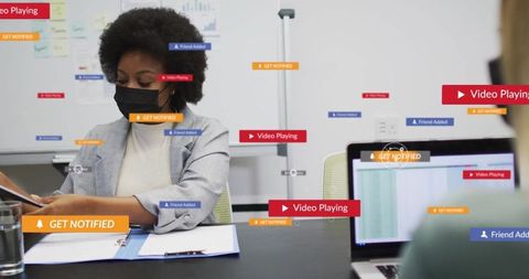 Professional Woman Focusing on Work in Modern Office with Digital Elements