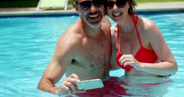 Happy Couple Taking Selfie in Swimming Pool - Download Free Stock Images Pikwizard.com