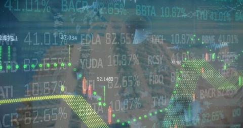 Financial analyst with transparent display analyzing stock market trends