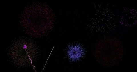 Vibrant fireworks display in night sky celebration