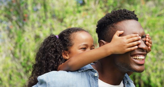 Happy Child Covering Father's Eyes with Hands in Park - Download Free Stock Images Pikwizard.com