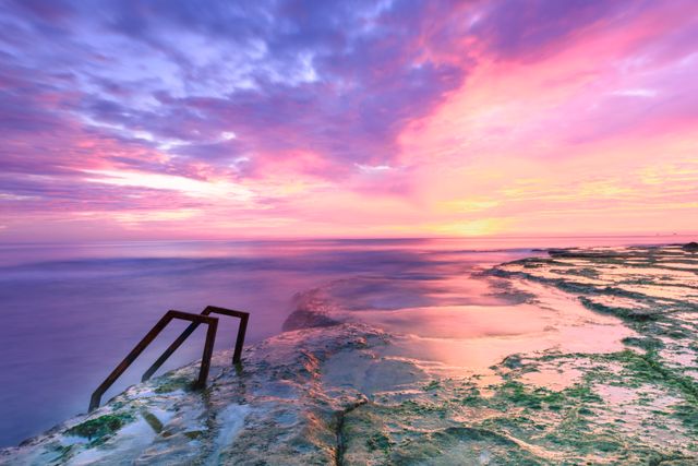 Sunset Over Rocky Shore with Ocean Stairs - Download Free Stock Photos Pikwizard.com